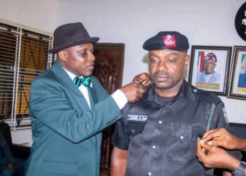 Ika Council Boss Decorates Newly Promoted Police Officer