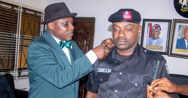 Ika Council Boss Decorates Newly Promoted Police Officer